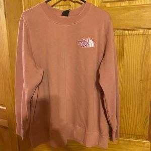North Face sweatshirt. New with tags. Never worn.